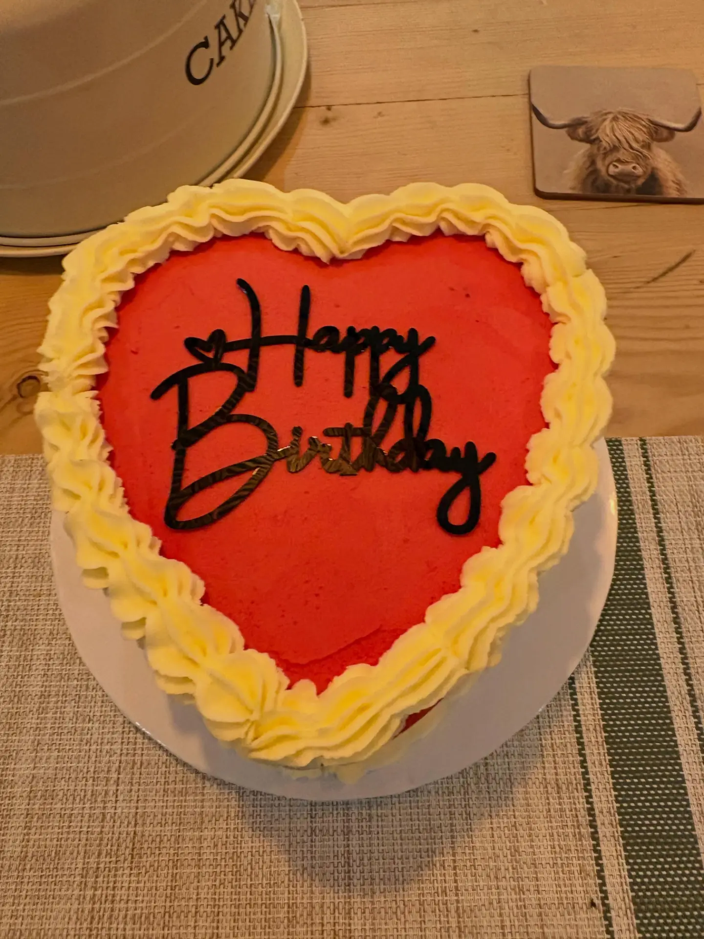 Heart-shaped Happy Birthday cake