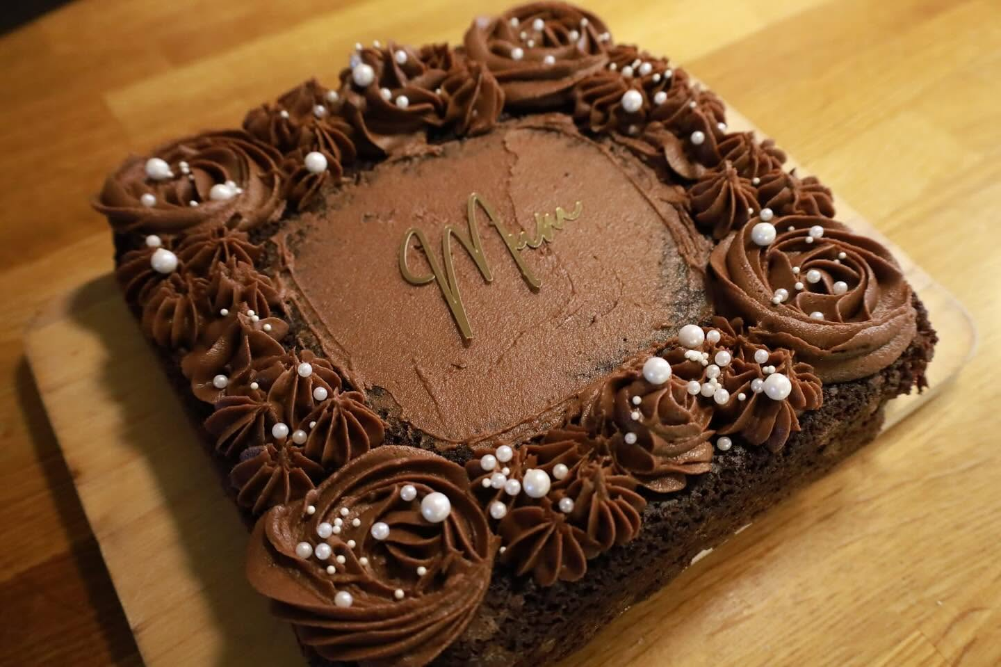 Chocolate celebration cake with piped roses